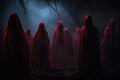 Group of People in Red Hooded Cloaks Royalty Free Stock Photo