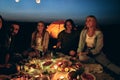 The group of people rest on the nature in night