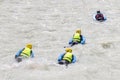 Group of people on river bugs in white water, active vacations team concept