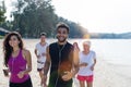 Group Of People Running, Young Sport Runners Jogging On Beach Working Out Smiling Happy, Fit Male And Female Joggers Royalty Free Stock Photo