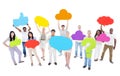 Group of People Sharing Ideas and Holding Social Media Icons Royalty Free Stock Photo