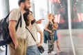 Group of people looking new fashion clothes at shop window Royalty Free Stock Photo