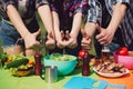 Group of people showing thumbs up to table of food. Royalty Free Stock Photo