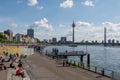 Group of People sit inside circle for social distancing with epidemic of COVID-19 in DÃÂ¼sseldorf, Germany.