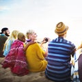 Group Of People Sitting On the Beach Concept Royalty Free Stock Photo