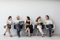 Group of people sitting on chairs Royalty Free Stock Photo