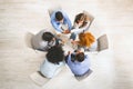 Group of people sitting in circle, dicussing problems during therapy session Royalty Free Stock Photo