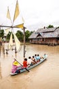 Group of people sitting in long tail boat