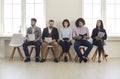 Group of people sitting in office waiting for job interview or business appointment Royalty Free Stock Photo