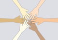 Group of people stacking hands shows unity and teamwork.
