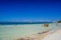 Group of people standin in the water beach on a sunny day in Cancun, Yukatan, Mexico Royalty Free Stock Photo
