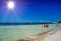 Group of people standin in the water beach on a sunny day in Cancun, Yukatan, Mexico Royalty Free Stock Photo