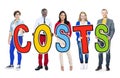 Group of People Standing Holding Costs Letter Royalty Free Stock Photo