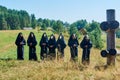 a group of people are standing in the masks of the plague doctor