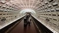 Group of people are standing on a metro train platform, waiting for the next train to arrive. Royalty Free Stock Photo