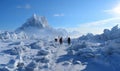 Group of People Standing on Snow Covered Mountain Top Royalty Free Stock Photo
