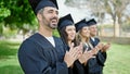 Group of people students graduated clapping applause at university campus