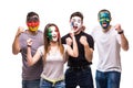 Group of people supporters fans of national teams with painted flag face of Germany, Mexico, Korea Republic, Sweden happy scream o