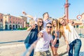 Group of people taking selfie