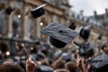 A group of people are throwing their graduation caps in the air Royalty Free Stock Photo