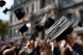 A group of people are throwing their graduation caps in the air Royalty Free Stock Photo