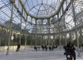 A group of people and tourist inside el retiro park crystal palace Royalty Free Stock Photo