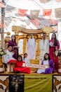 Group of people with traditional customs on decorated stage during the annual dancing parade Royalty Free Stock Photo