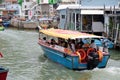 Group of people traveling with a boat at the dragon boat festival in Taio O, Hong Kong Royalty Free Stock Photo