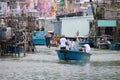 Group of people traveling with a boat at the dragon boat festival in Taio O, Hong Kong Royalty Free Stock Photo