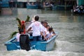 Group of people traveling with a boat at the dragon boat festival in Taio O, Hong Kong Royalty Free Stock Photo