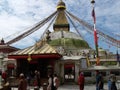 Group of people under the great Boudhanath stupa in Kathmandu, Nepal Royalty Free Stock Photo