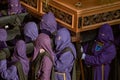 Group of people in the vestments of the holy week of Astorga in Spain.