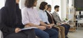 Group of people waiting for a job interview, appointment or business presentation Royalty Free Stock Photo