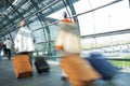 Group of people walking at airport, real people Royalty Free Stock Photo