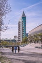 Lisbon PORTUGAL - 28 March 2023 - People walking in Parque das NaÃ§Ãµes next to Altice Arena and luxury tower