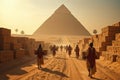 A group of people walking on a sandy road in front of the pyramids Royalty Free Stock Photo