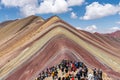 Group of people watching Rainbow mountain Peru South America