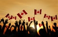 Group of People Waving Canadian Flag