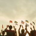 Group of people waving country flags. Royalty Free Stock Photo