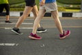 Group of people wear sport shoes walking, running, exercise together outdoors workout in the park Royalty Free Stock Photo