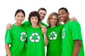 Group of people wearing green shirt with recycling symbol on it Royalty Free Stock Photo