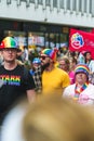 Group of people wearing rainbow-colored hats, t-shirts, and scarves during the Malmo Pride festival