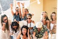 Group of people women friends have fun together celebrating with confetti and happiness - concept of friendship and event Royalty Free Stock Photo