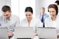 Group of people working with laptops in office Royalty Free Stock Photo