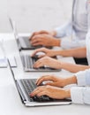 Group of people working with laptops in office Royalty Free Stock Photo