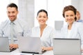 Group of people working with laptops in office Royalty Free Stock Photo