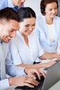 Group of people working with laptops in office Royalty Free Stock Photo