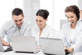 Group of people working with laptops in office Royalty Free Stock Photo