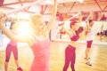 Group of people working out with barbells in gym Royalty Free Stock Photo