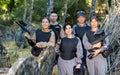 Group photo of cheerful male and female paintball players Royalty Free Stock Photo